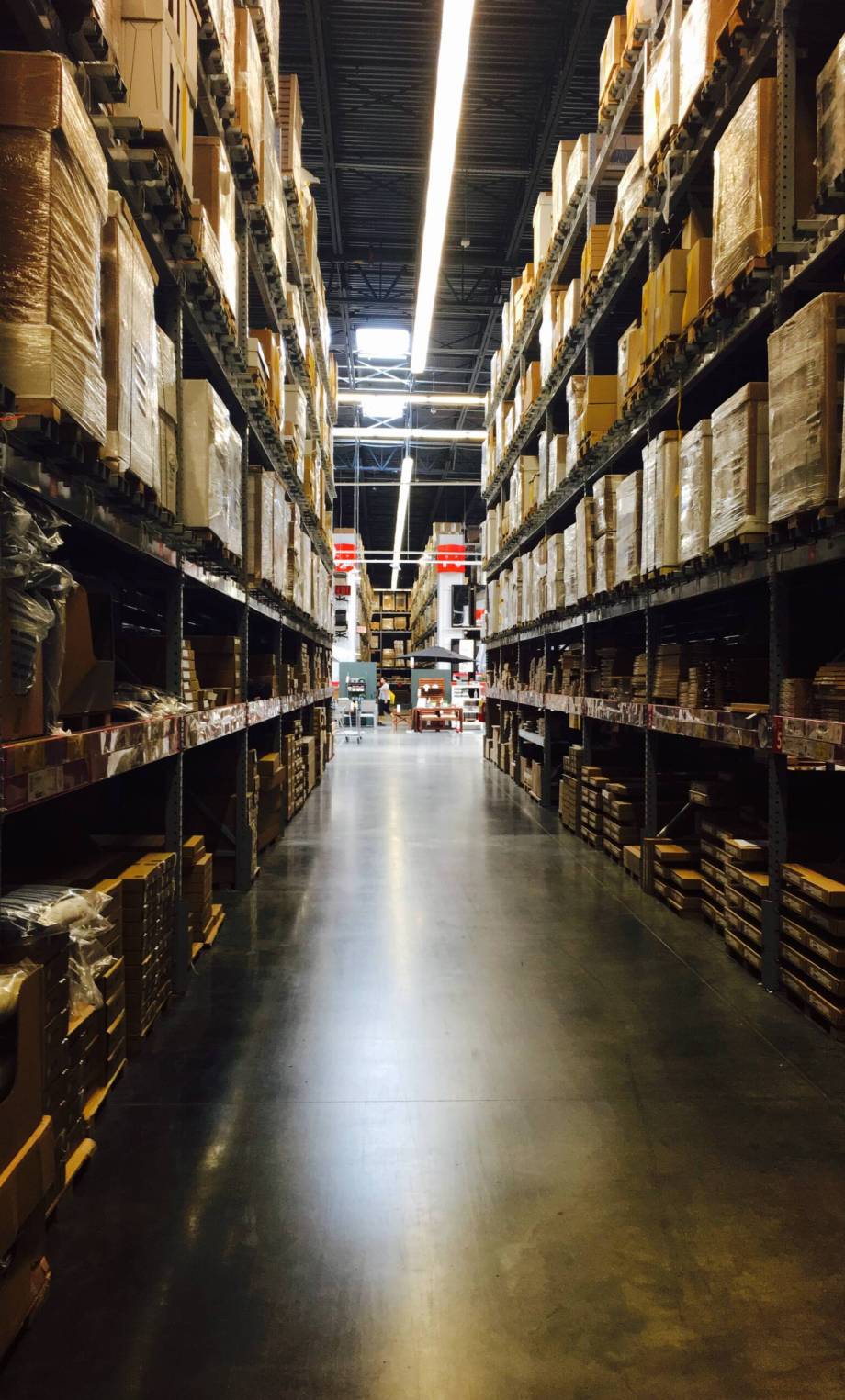 looking-down-aisle-of-warehouse-2026-01-07-00-45-18-utc